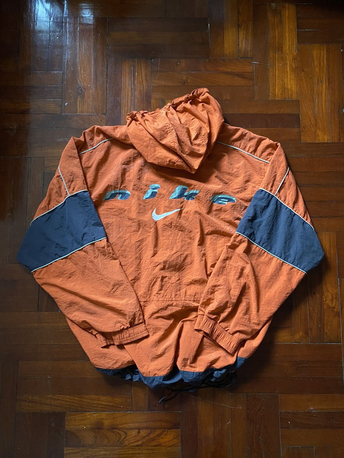 image of Nike Spell Out 90's Windbreaker Hoodie Jacket in Orange, Men's (Size Large)