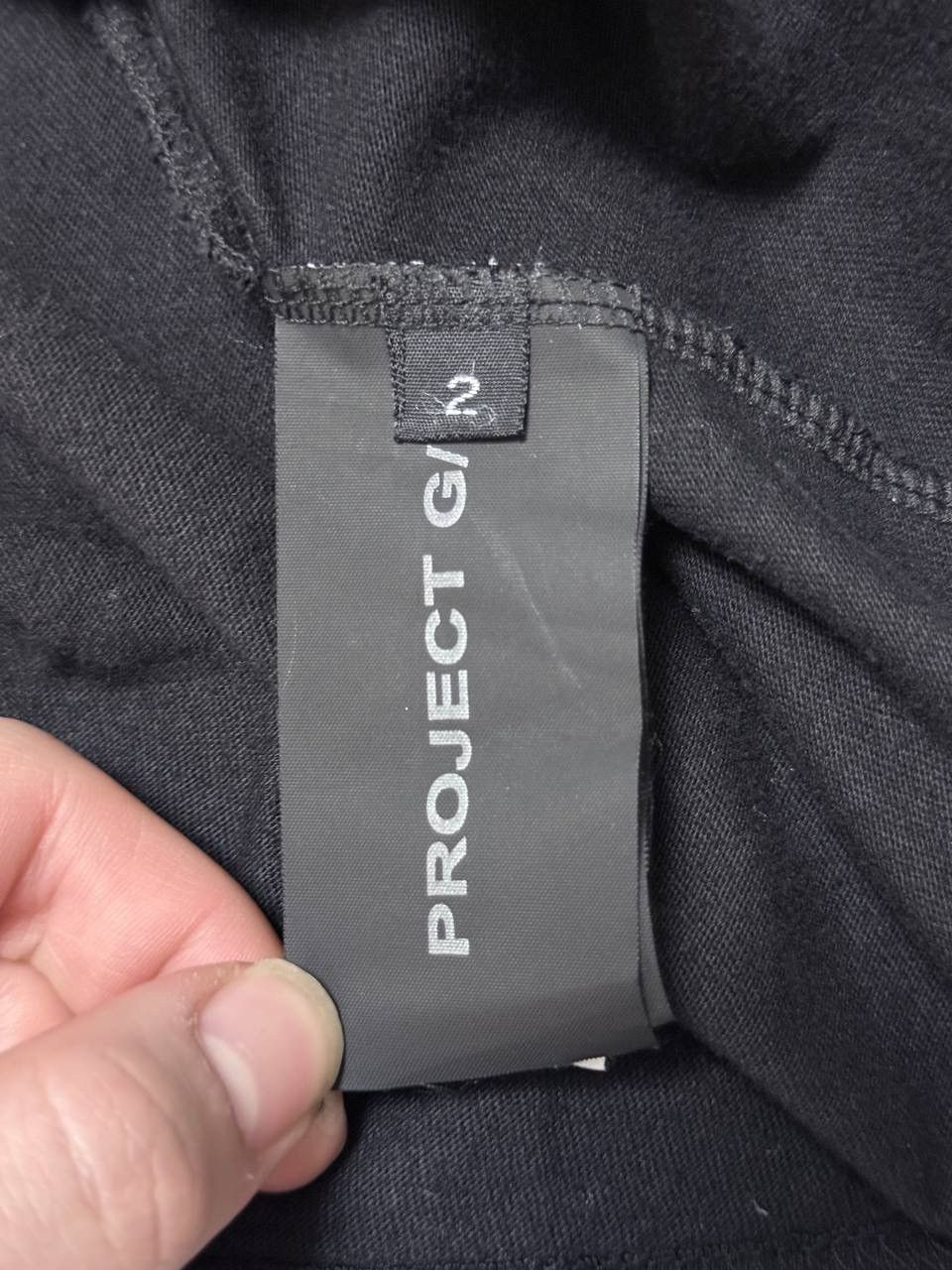 PROJECT G/R Project G/R Split Tee – “2025” Graphic (Size 2) Size US M / EU 48-50 / 2 - 4 Thumbnail