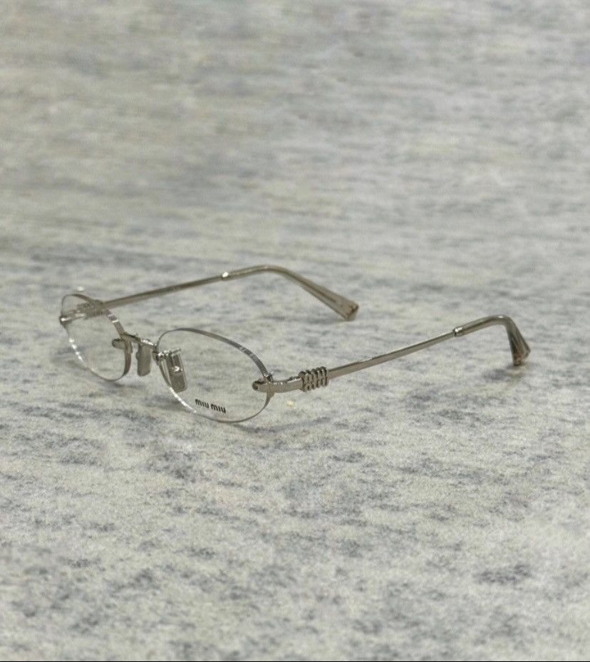 Miu Miu MIU MIU MU 53WV 1BC1O1 Sunglasses | Grailed