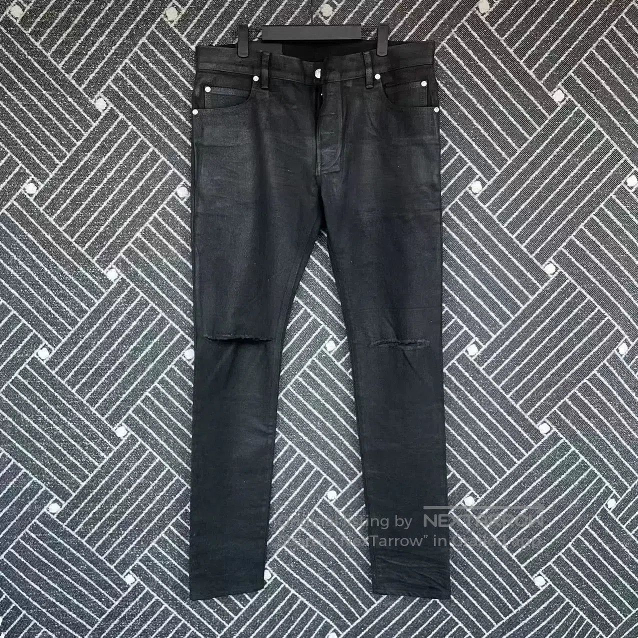 BALMAIN Wax-Coated Distressed Jeans.