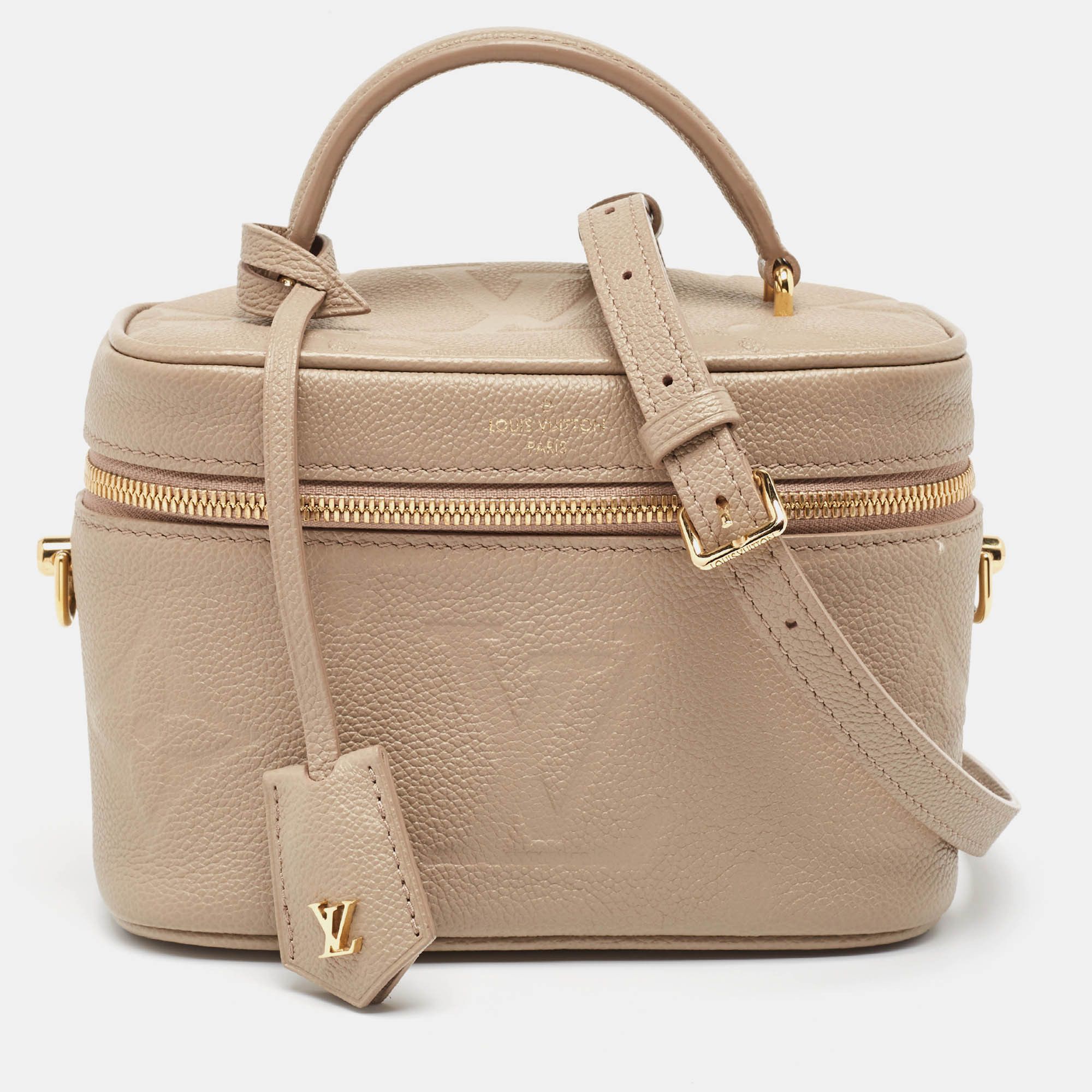 image of Louis Vuitton Tourterelle Empreinte Monogram Giant Vanity Pm Bag in White, Women's