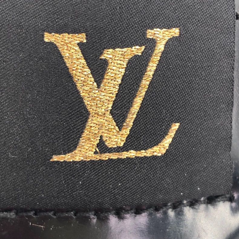 Louis Vuitton Black logo embossed leather lace-up Martin b