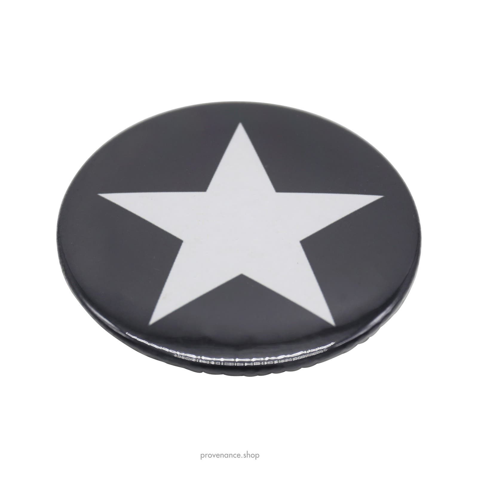 image of Givenchy Star Pin in Black, Men's