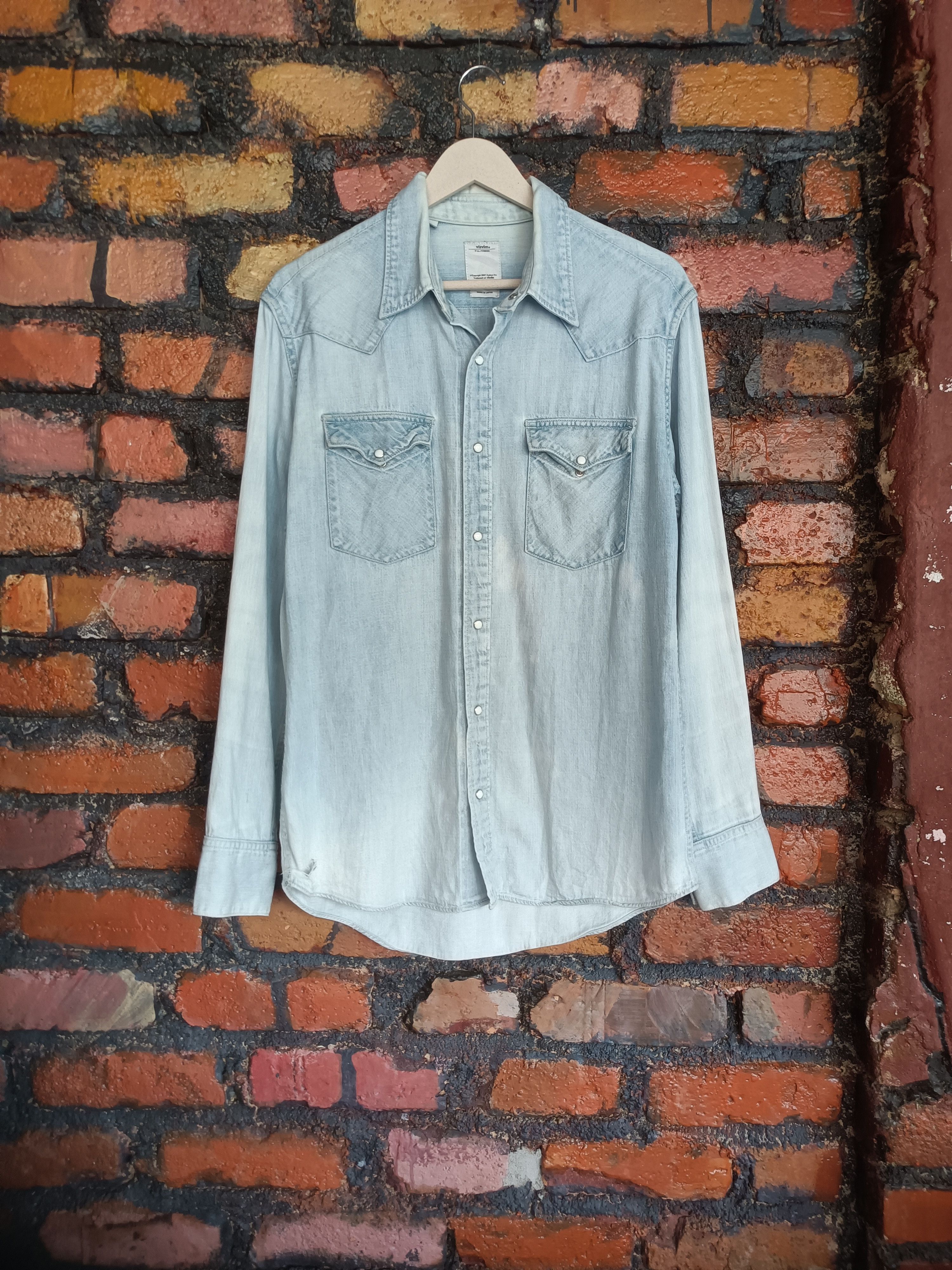 image of Vintage Visvim Distressed Denim Jacket in Faded Blue, Men's (Size Medium)