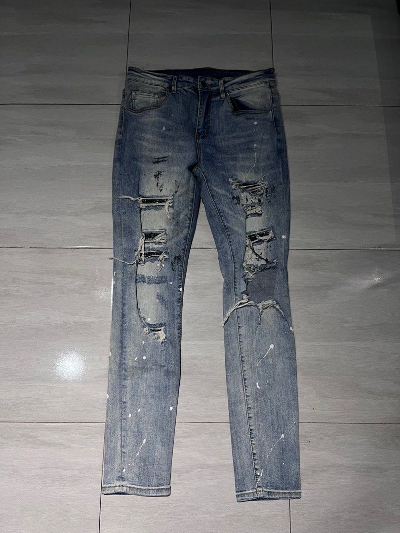 Amiri ripped distressed vintage denim faded