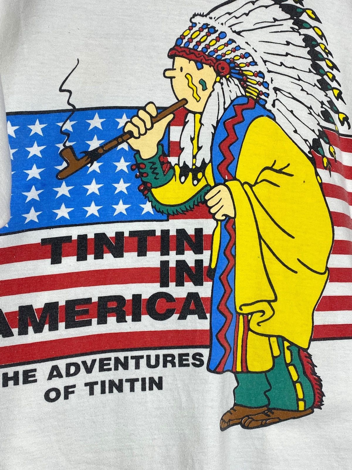 Cartoon Network 🔥 TINTIN IN AMERICA 90s GRAPHIC TEE USA INDIGENOUS VIBES Size US M / EU 48-50 / 2 - 4 Thumbnail