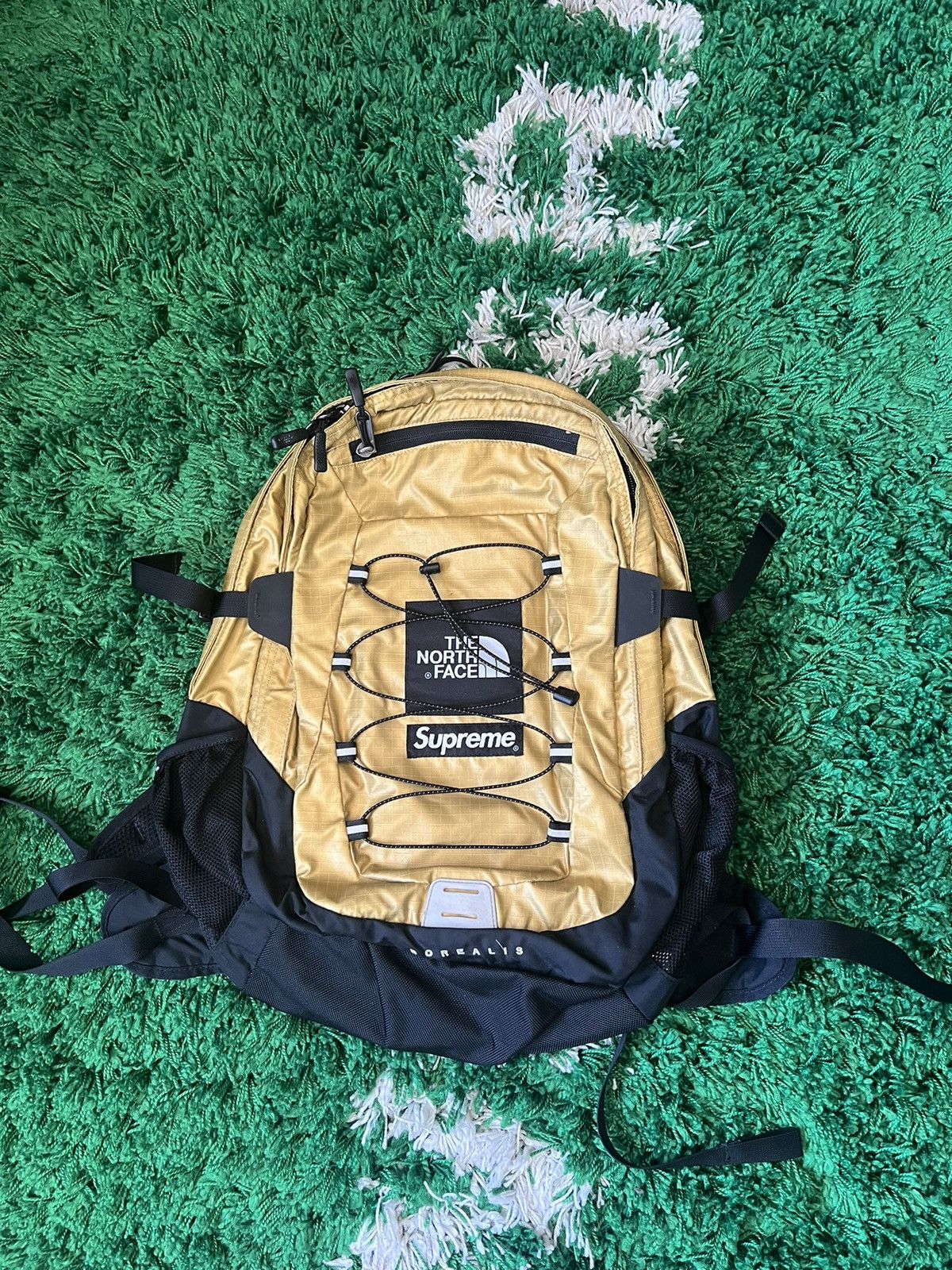 Supreme north face gold backpack online