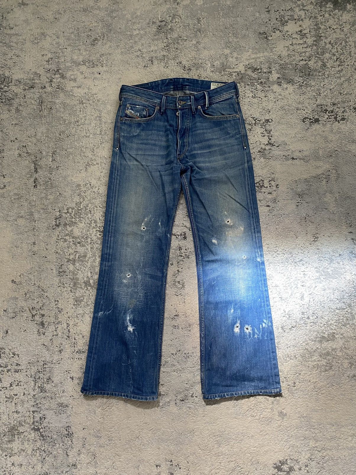 Diesel SS08 Zhavee Distressed Flare Jeans | Grailed