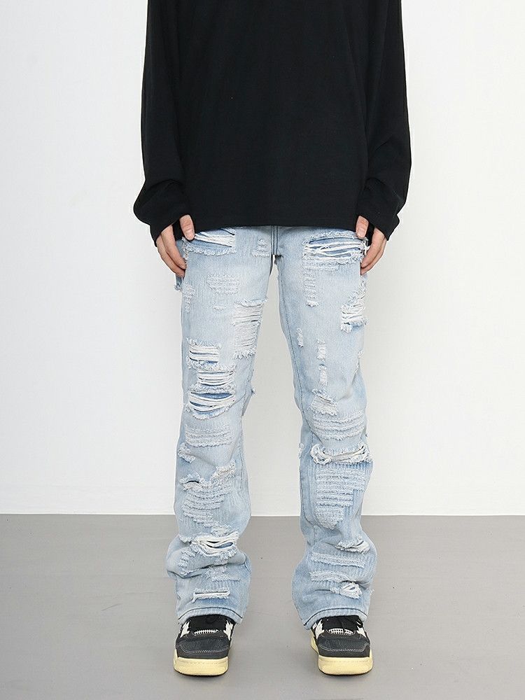 grunge damaged ripped washed flared jeans