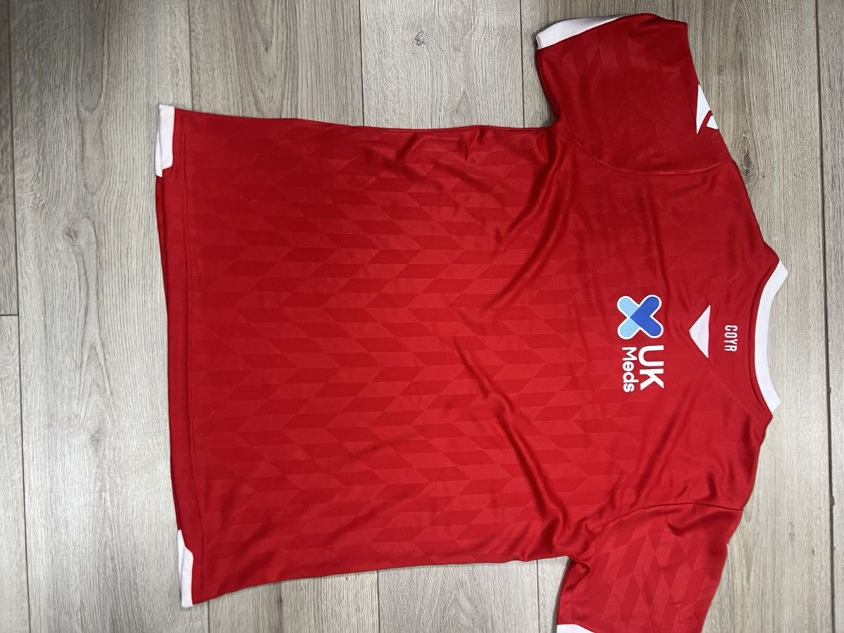 Macron Official Nottingham Forest football kit by Macron ❤️🌲 Size US XL / EU 56 / 4 - 8 Thumbnail