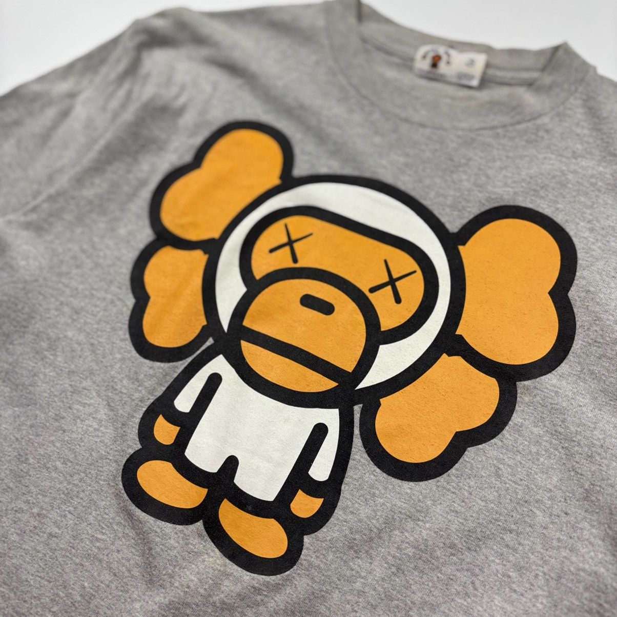 Bape × Kaws Bape x KAWS Baby Milo Shirt Size US S / EU 44-46 / 1 - 3 Thumbnail
