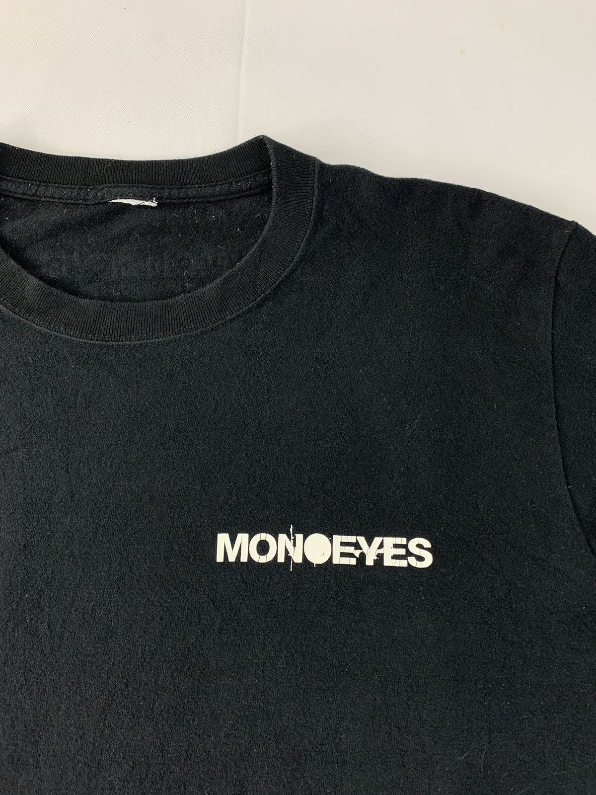 Monoeyes Mexican Standoff Sidetape Gothic Font Logo Tee