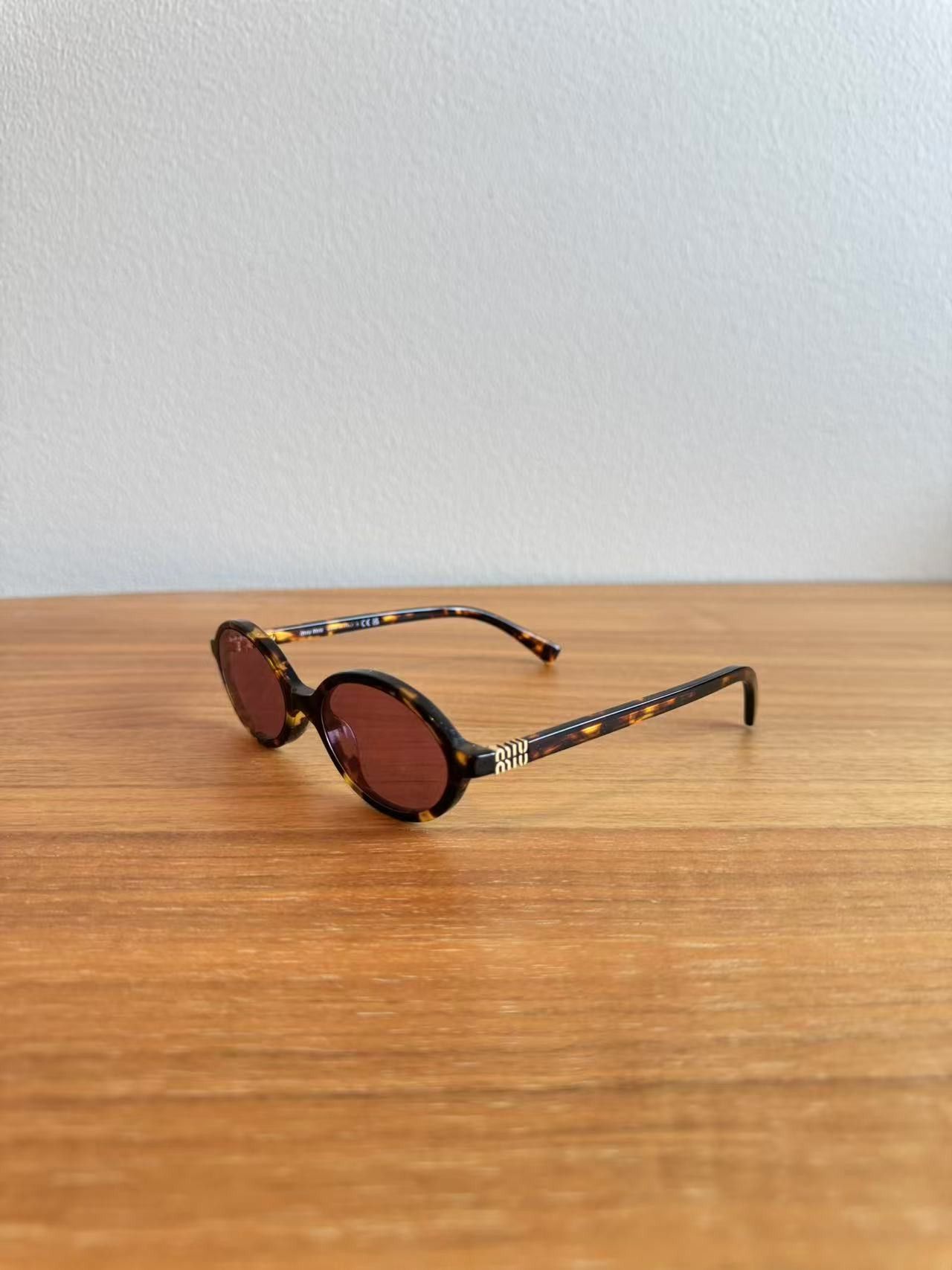 Miu Miu Miu Miu MU04ZS VAU50D Sunglasses Size ONE SIZE - 1 Thumbnail