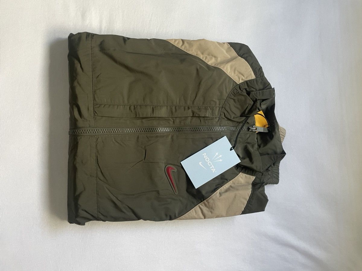 NOCTA × Nike Nike x NOCTA Track Jacket Cargo Khaki/Khaki/Team Red Size US M / EU 48-50 / 2 - 3 Thumbnail