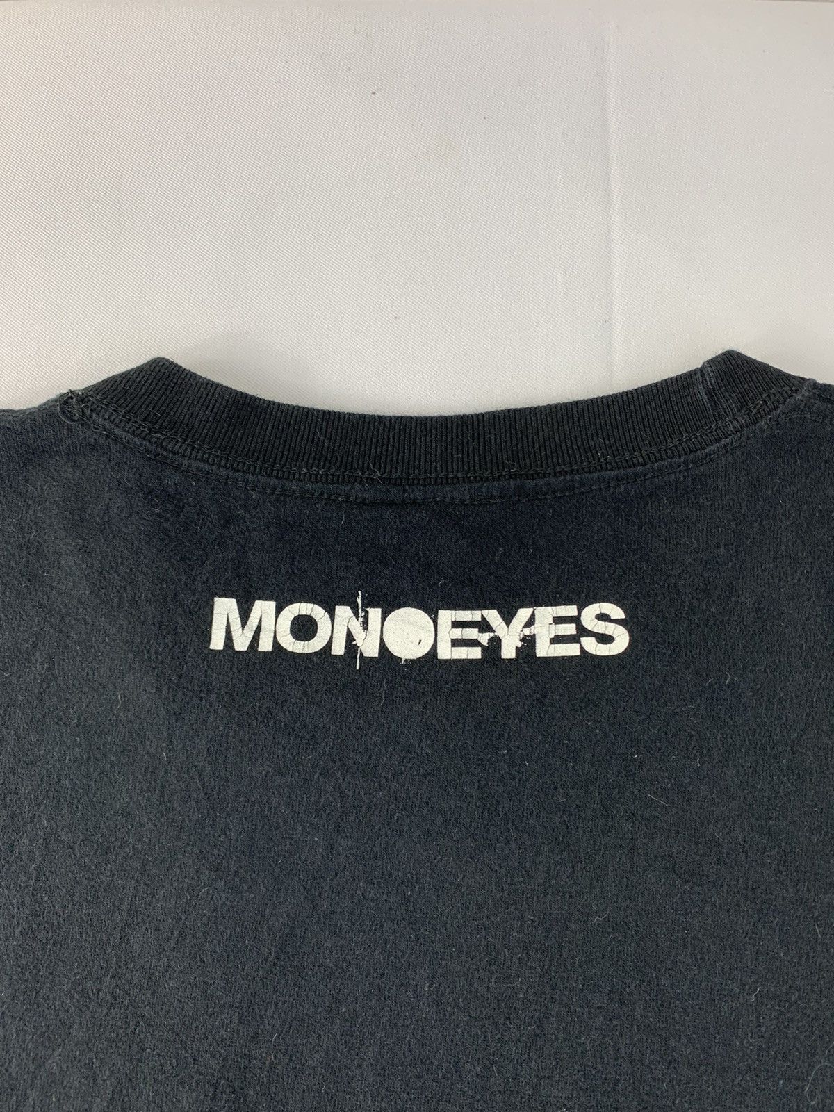 Monoeyes Mexican Standoff Sidetape Gothic Font Logo Tee