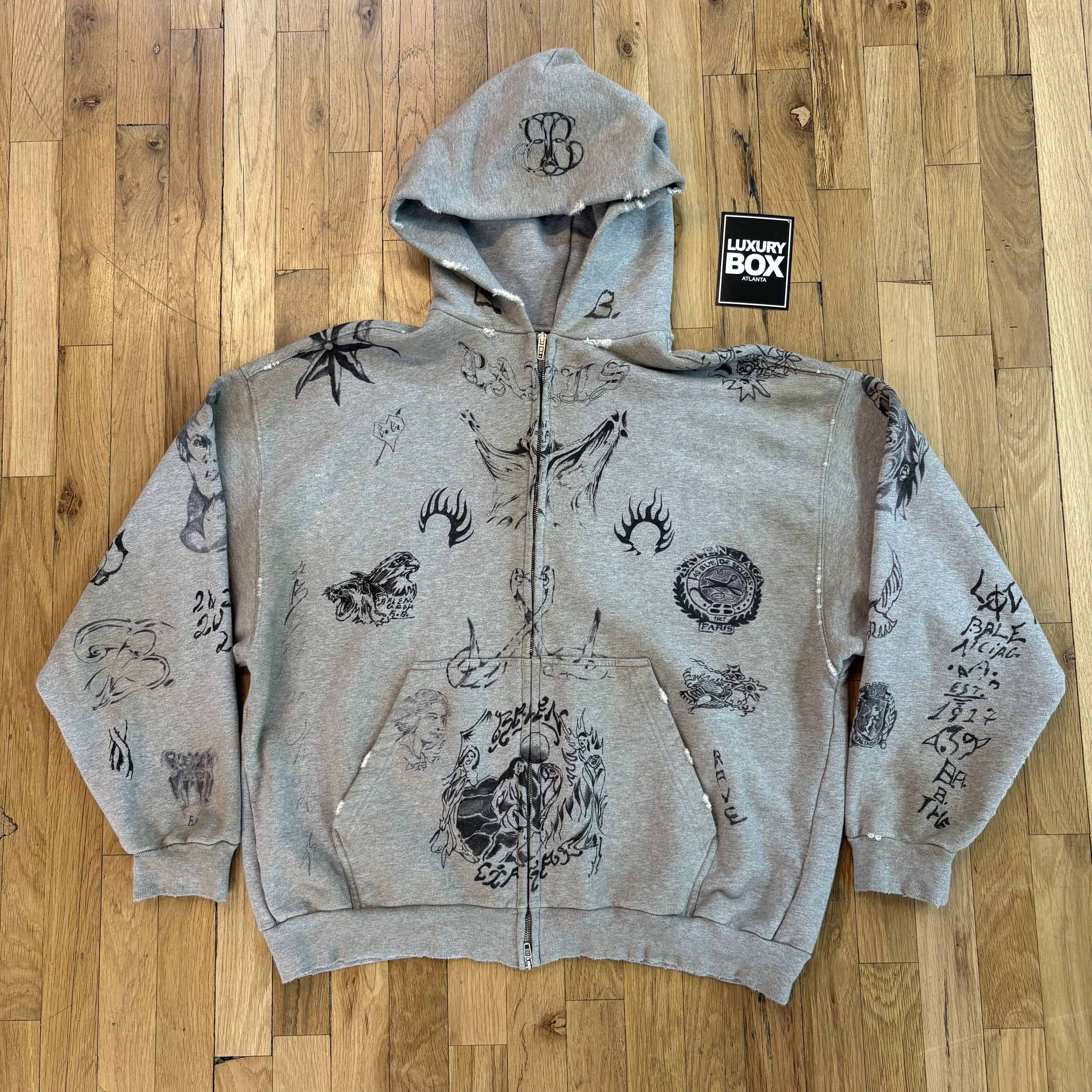 BALENCIAGA タトゥーデザイン メルトン ジップ フーディー ロゴ Balenciaga Tattoo Hoodie | Grailed