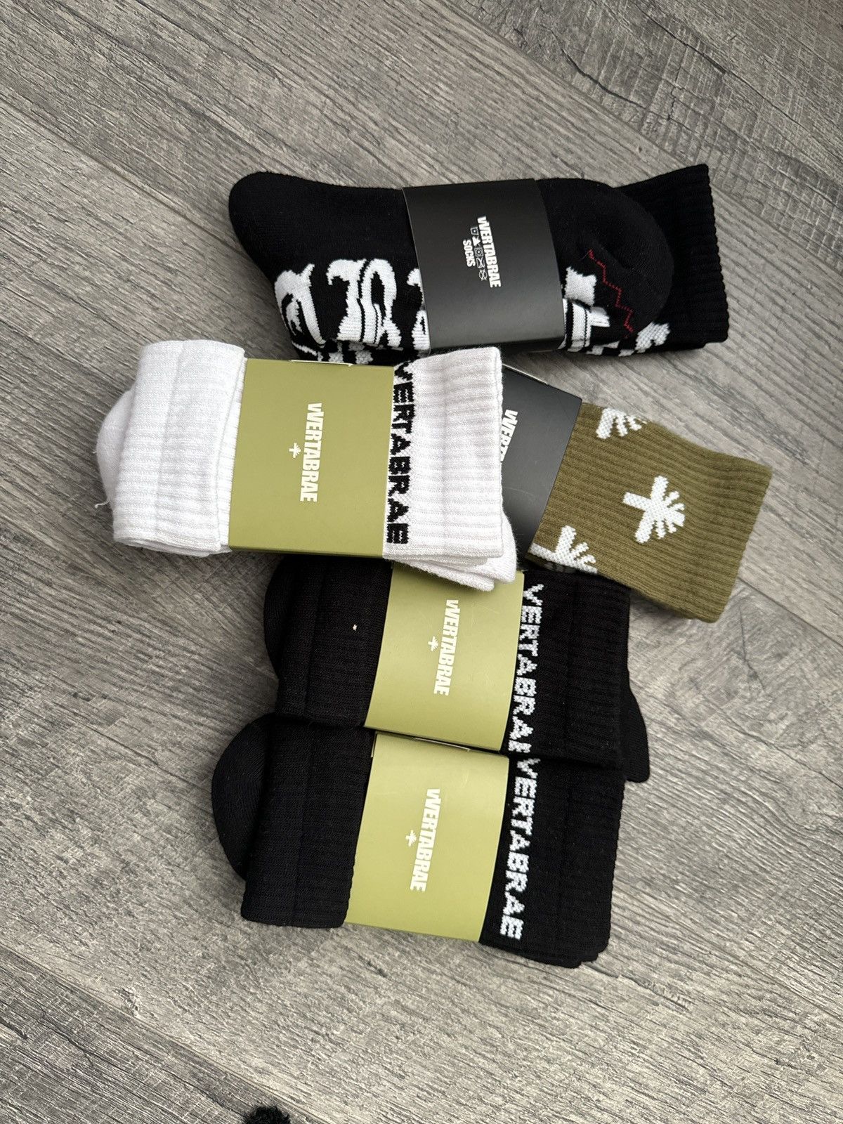 image of Vertabrae Logo Socks in Miltary Green, Men's