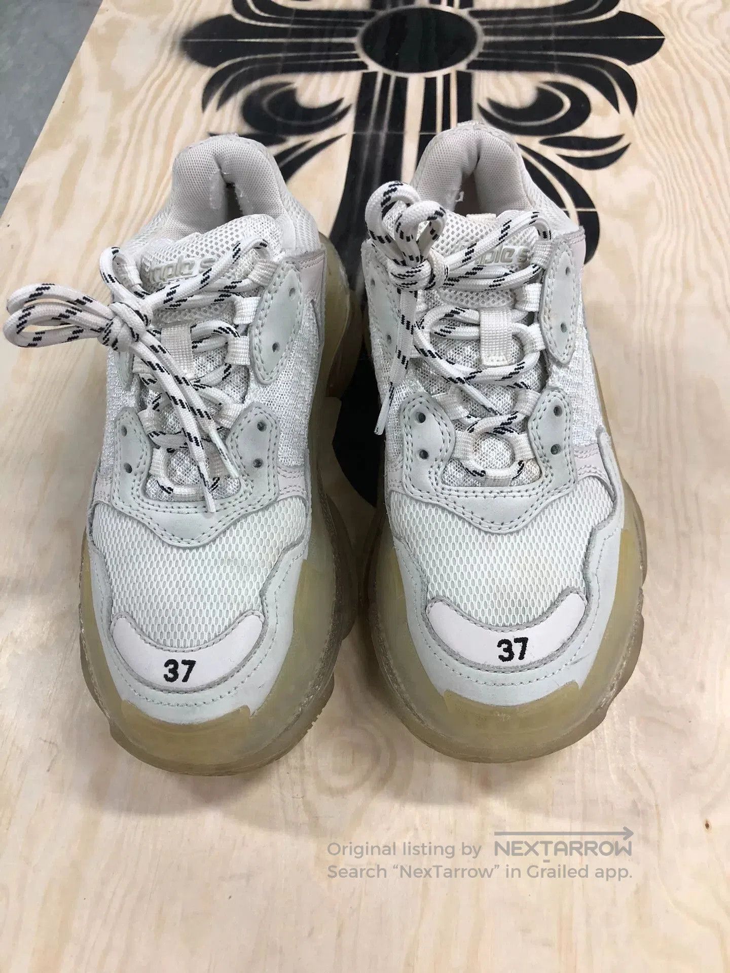 balenciaga triple s allover logo sneaker.