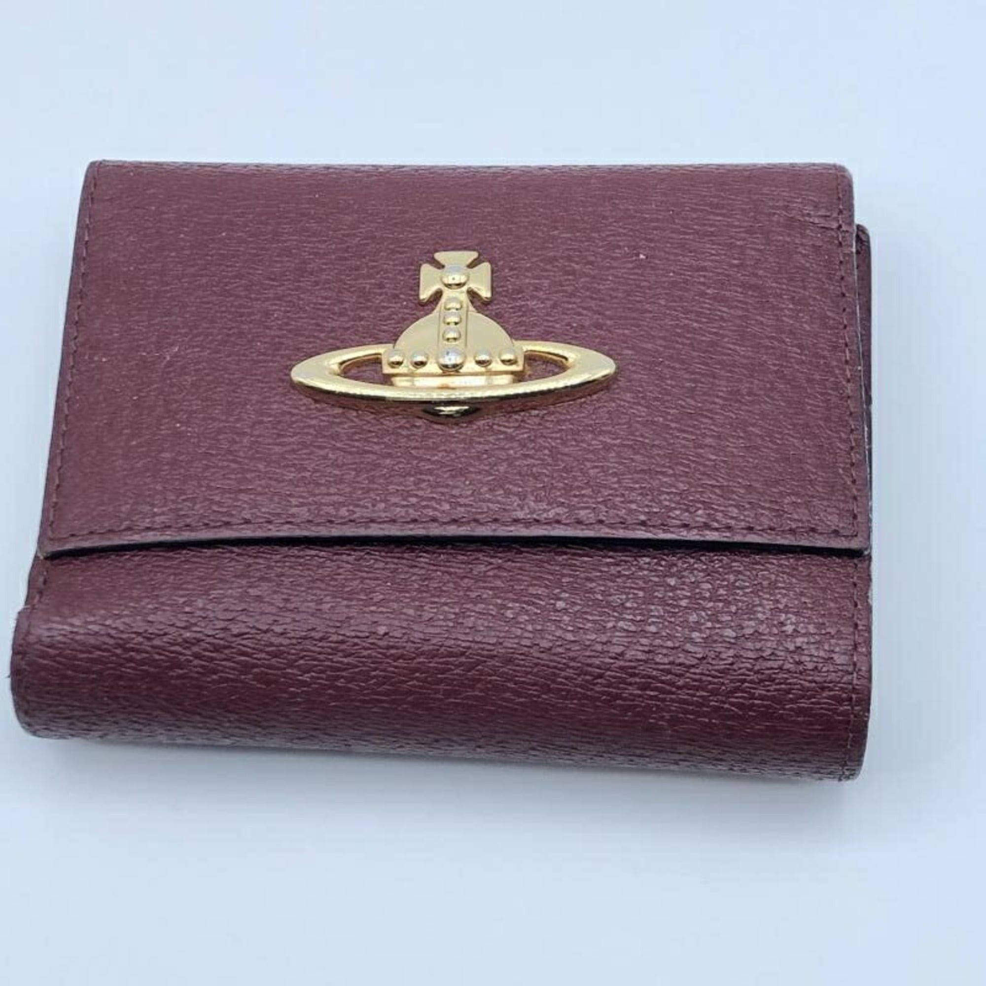 Vivienne Westwood tri-fold wallet in red.