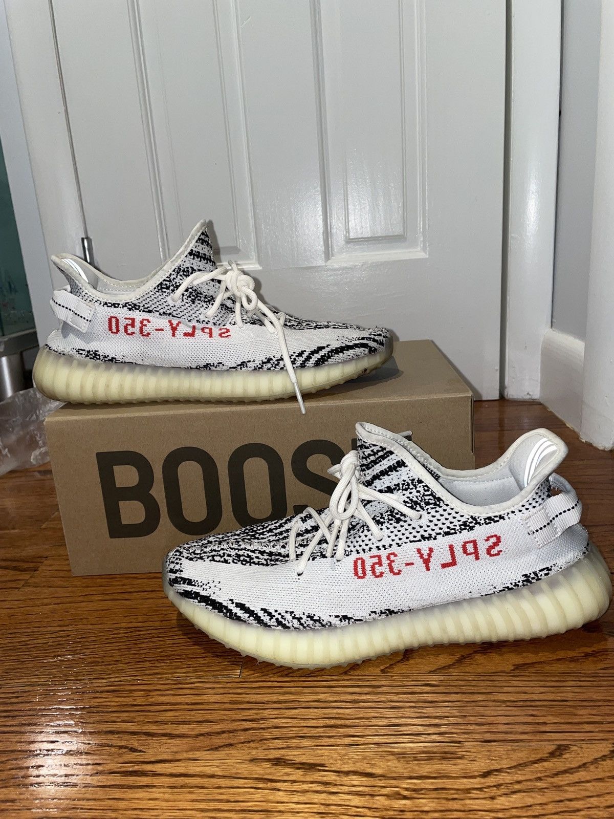 image of Adidas x Yeezy Season Yeezy Boost 350 V2 Zebras Shoes in White, Men's (Size 11)