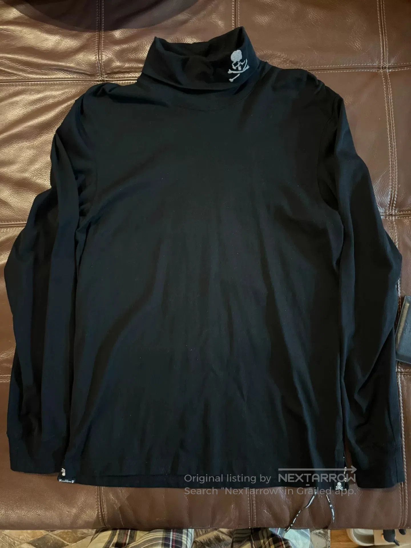 black high-neck long sleeve t-shirt.