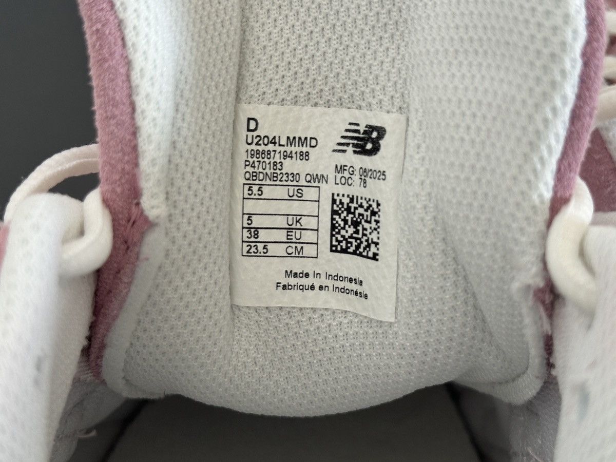 Pastel pink 204L New Balance suede sneakers
