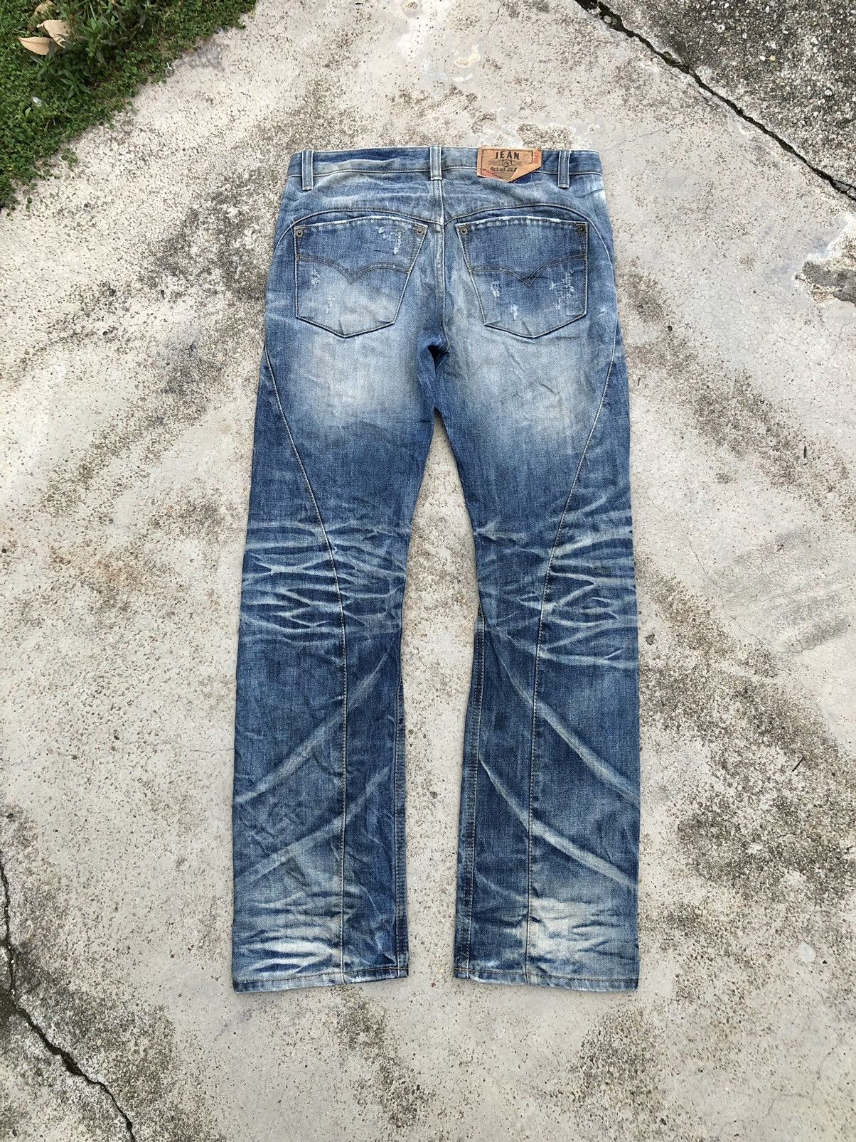WASHED BLUE DISTRESSED 4CHA1 JEANS