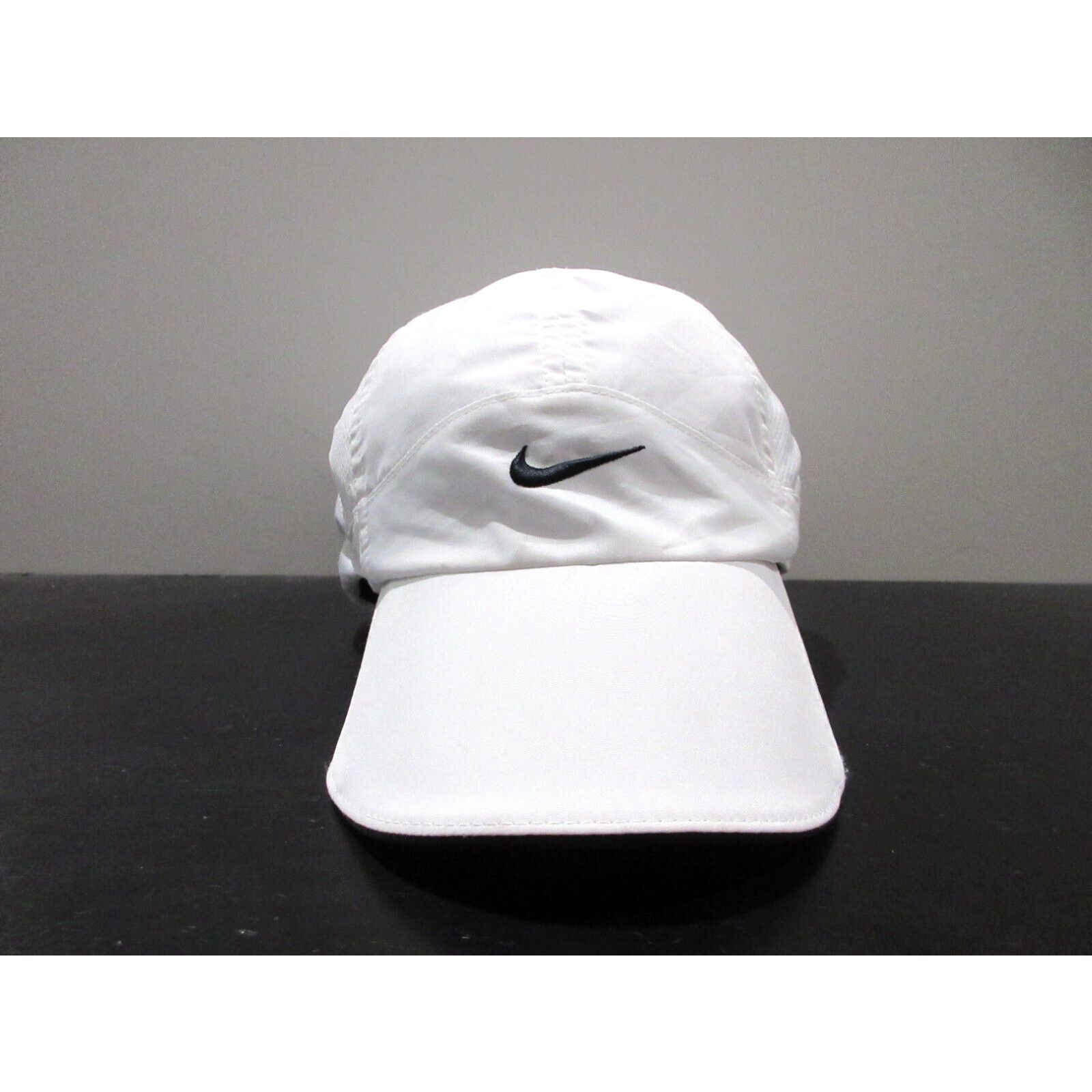 image of Vintage Nike Hat Cap Strap Back White Black Panel Lightweight Athletic Mens