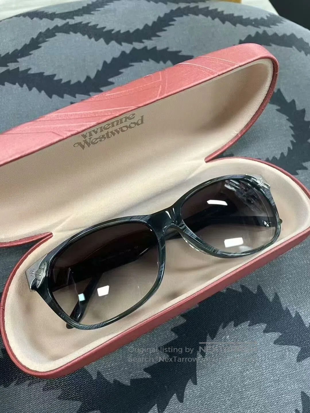 vivienne westwood saturn sunglasses with case.
