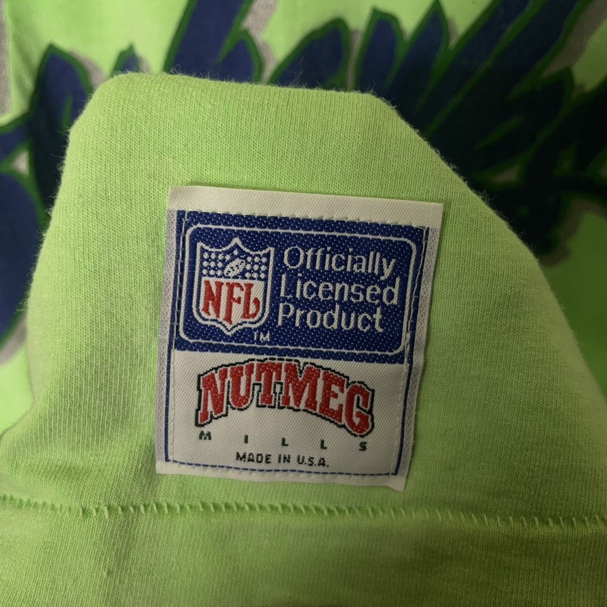 NFL × Nutmeg × Vintage Vintage 1990s Seattle Seahawks NFL Nutmeg Made in USA Tee Size US L / EU 52-54 / 3 - 4 Thumbnail