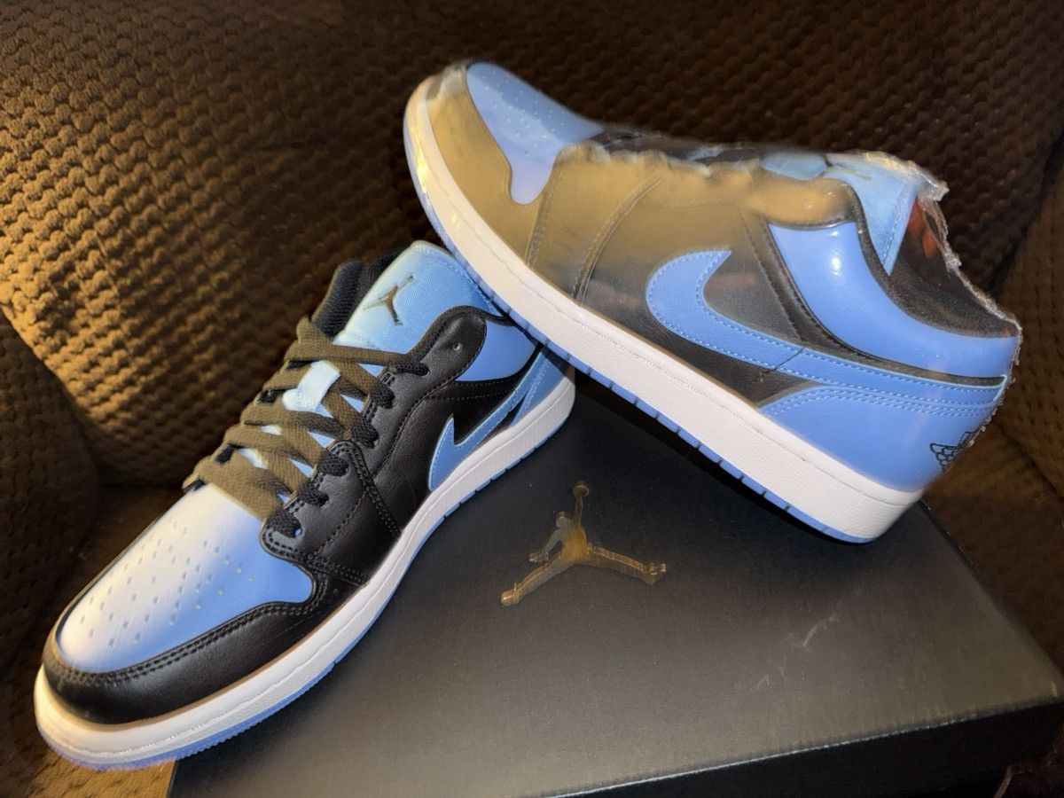Jordan Brand Nike Air Jordan 1 “UNC Blue” black/university blue NEW w/Box Size US 9 / EU 42 - 8 Thumbnail