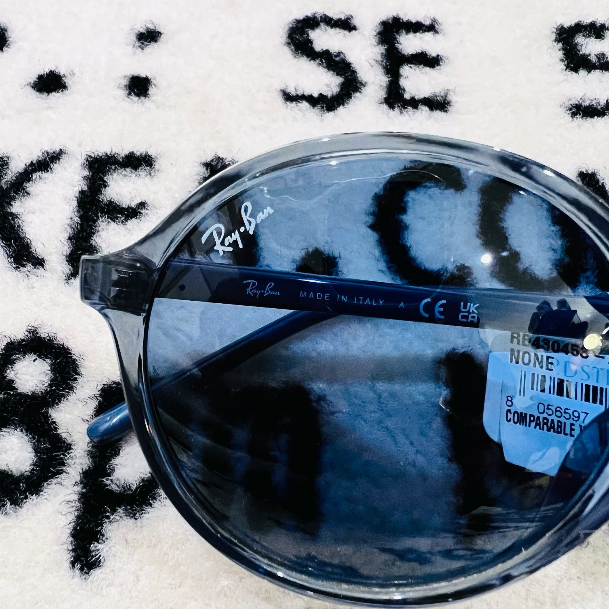 RayBan RayBan RB4304 Round Polished Transparent Blue Sunglasses Size ONE SIZE - 9 Thumbnail