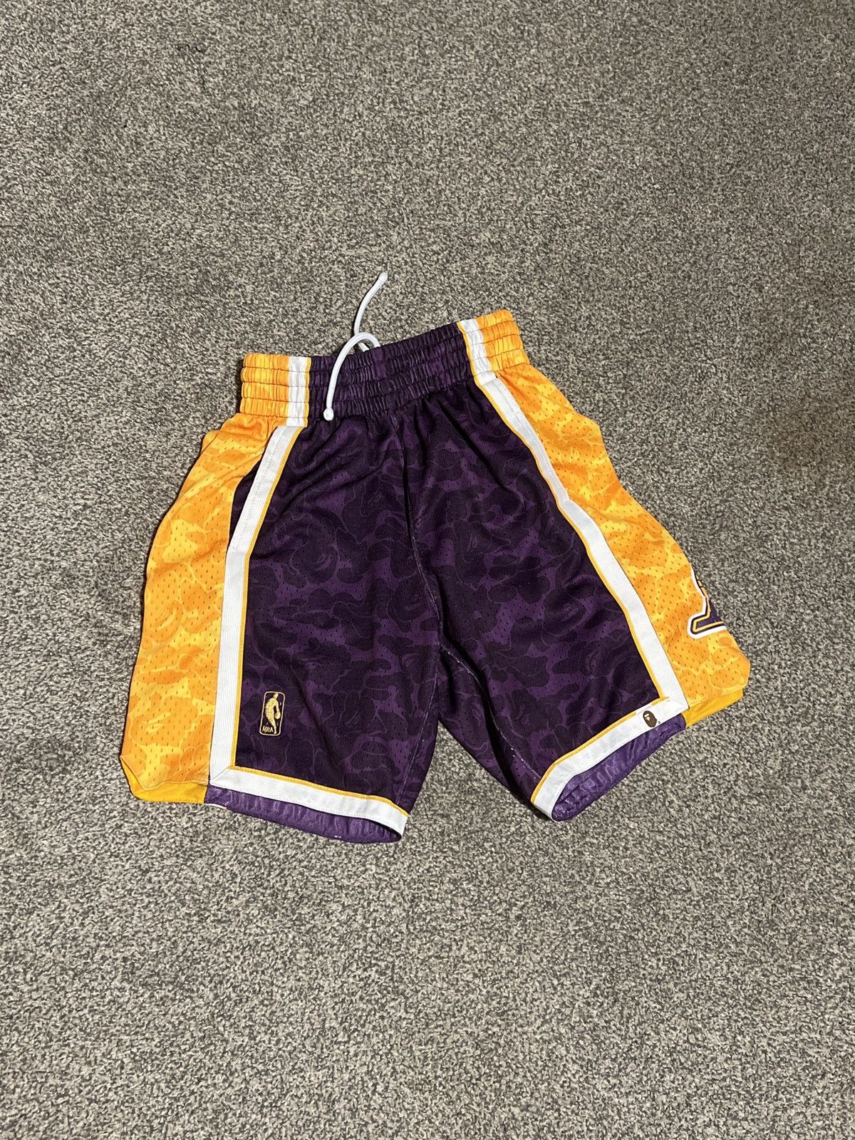 Bape laker shorts best sale