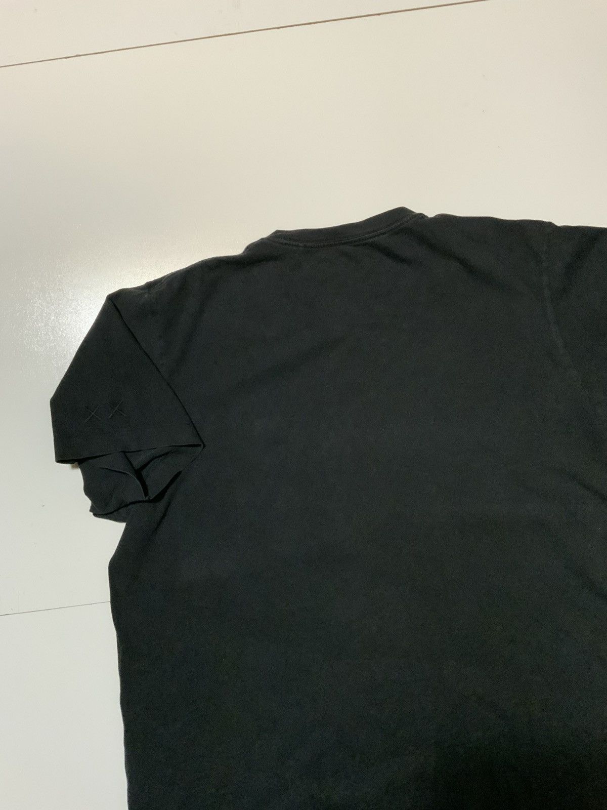 Kaws × Peanuts × Uniqlo Uniqlo UT X Kaws X Peanuts Ghost Black Crewneck S/S T-Shirt Size US L / EU 52-54 / 3 - 4 Thumbnail
