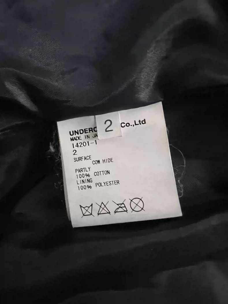 Undercover12ss She brings the rain leather