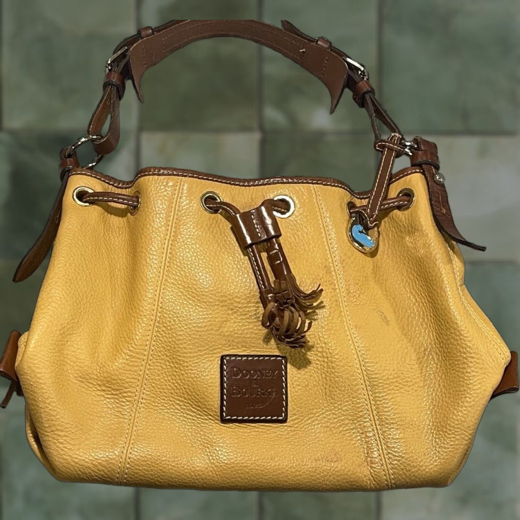 Dooney & Bourke Dooney & Bourke All Weather Leather Drawstring Bag Chamois Mustard Women Bucket & Drawstring Bag Leather 3.0 Pre-owned Size ONE SIZE - 1 Thumbnail