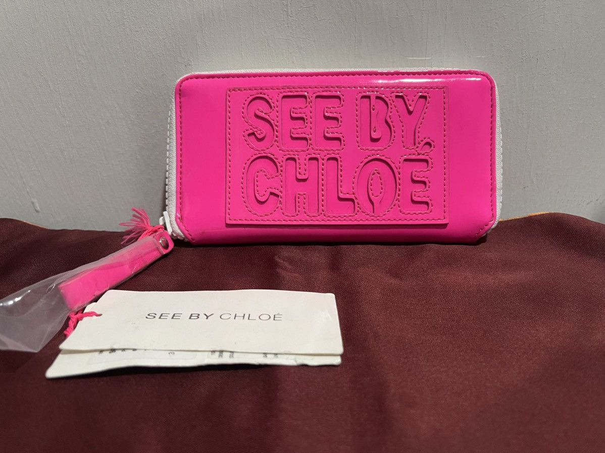 See by Chloe See by Chloé Long Zip File Wallet - Neon Pink Embossed Logo Size ONE SIZE - 1 Thumbnail