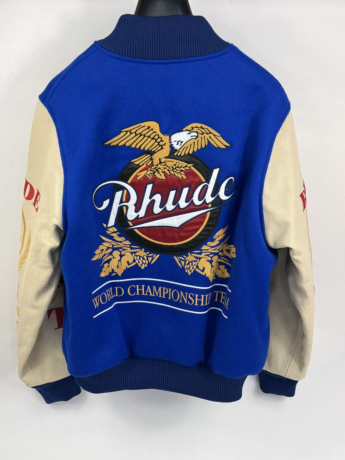 image of Rhude Leather Trimmed Embroidered Racing Varsity Jacket in Blue, Men's (Size Medium)