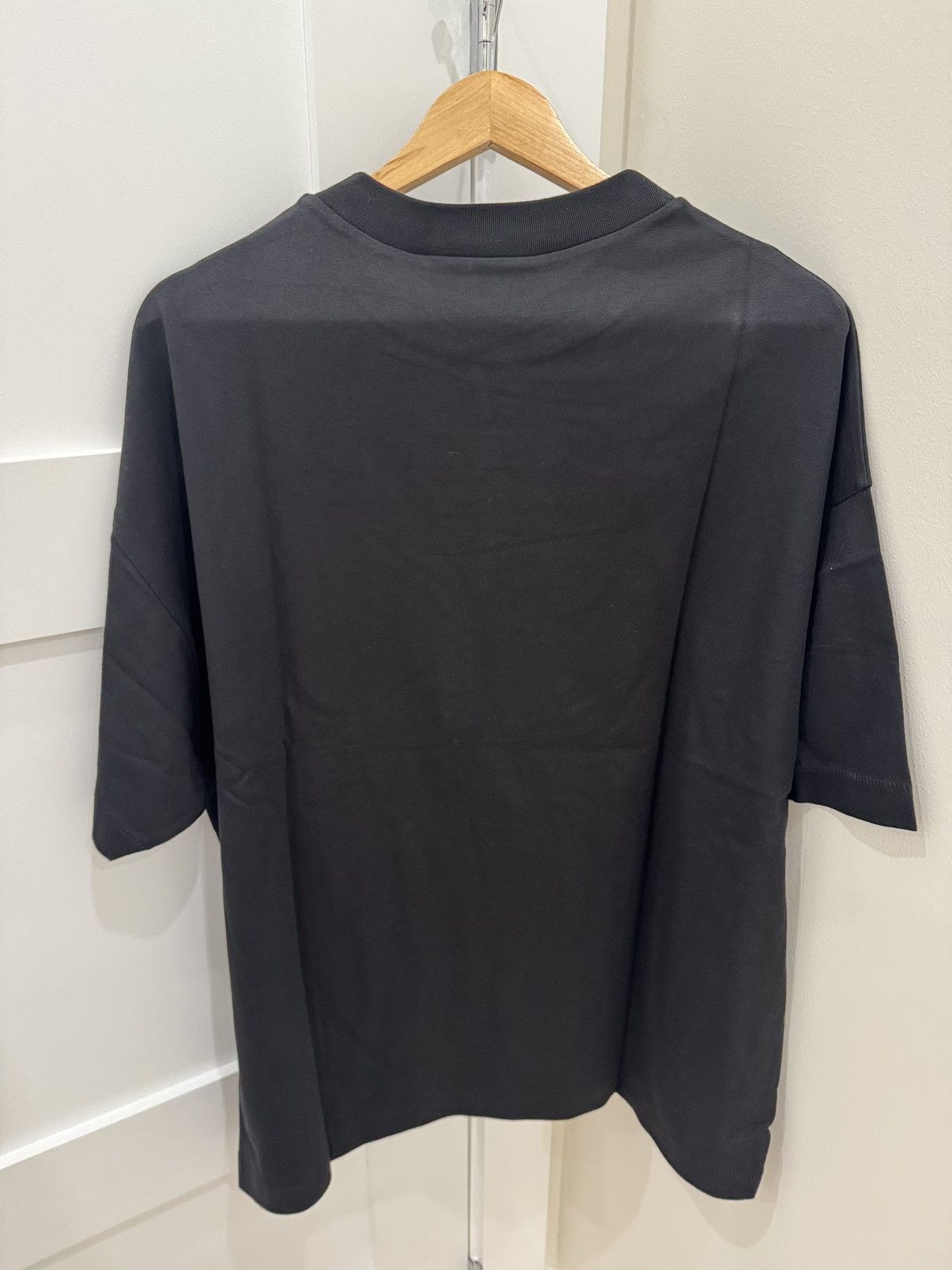 Essentials × Fear of God Jet black Essentials crewneck tee (XS) Size US XS / EU 42 / 0 - 2 Thumbnail