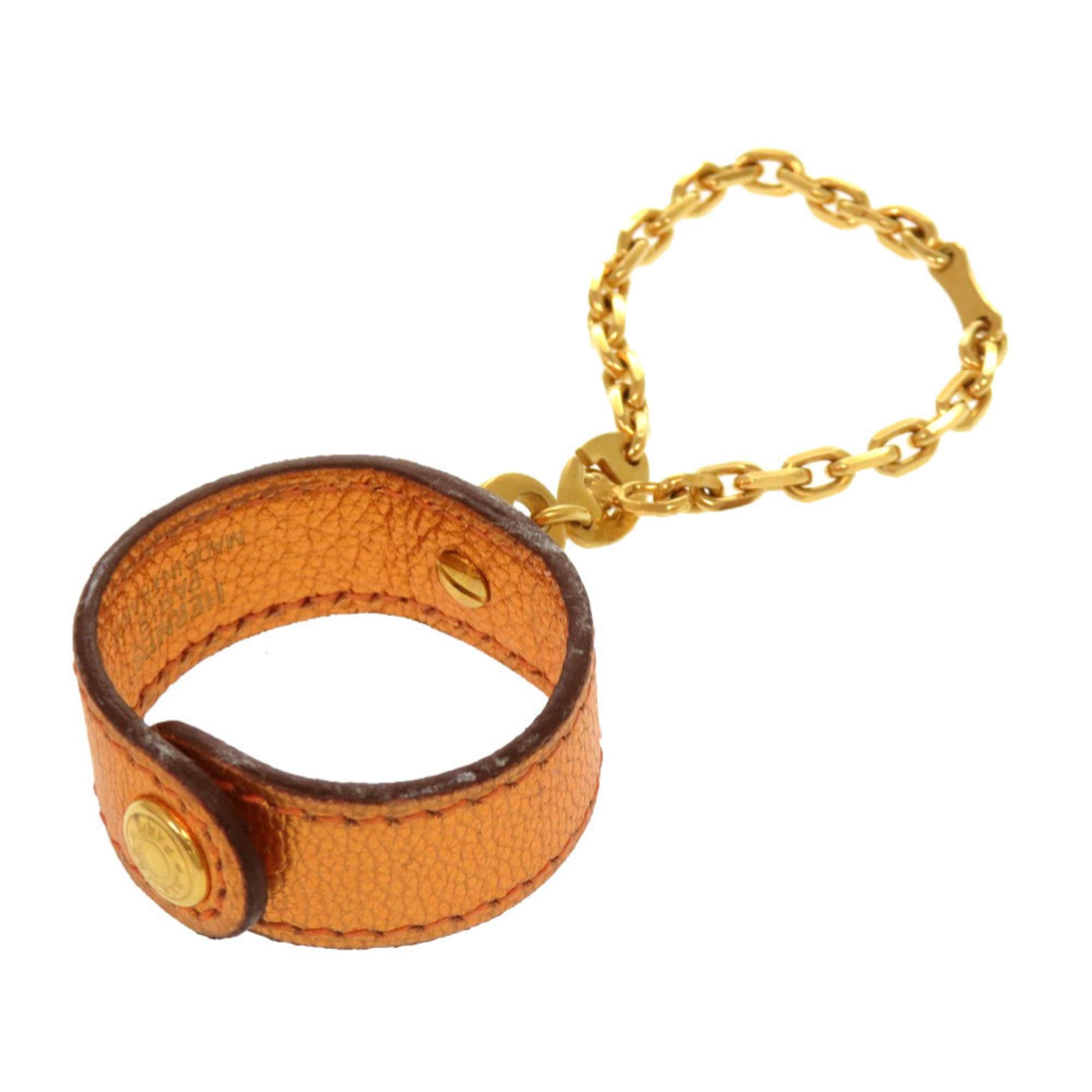 Hermes Hermes Excellent condition Hermès glove holder bag charm, orange leather with gold hardware and H stamp, item number 0966 Size ONE SIZE - 1 Thumbnail