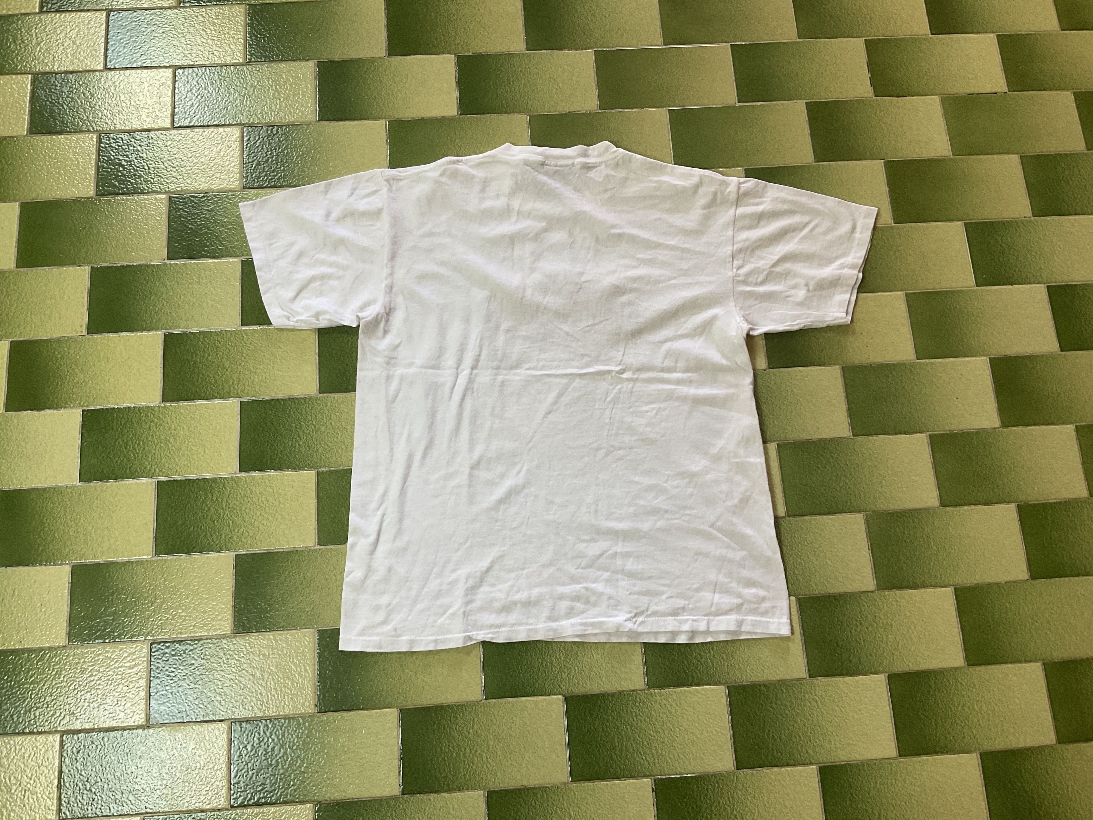 Vintage 90s Stitched Gold & Silver Universal Florida Tee Menswear