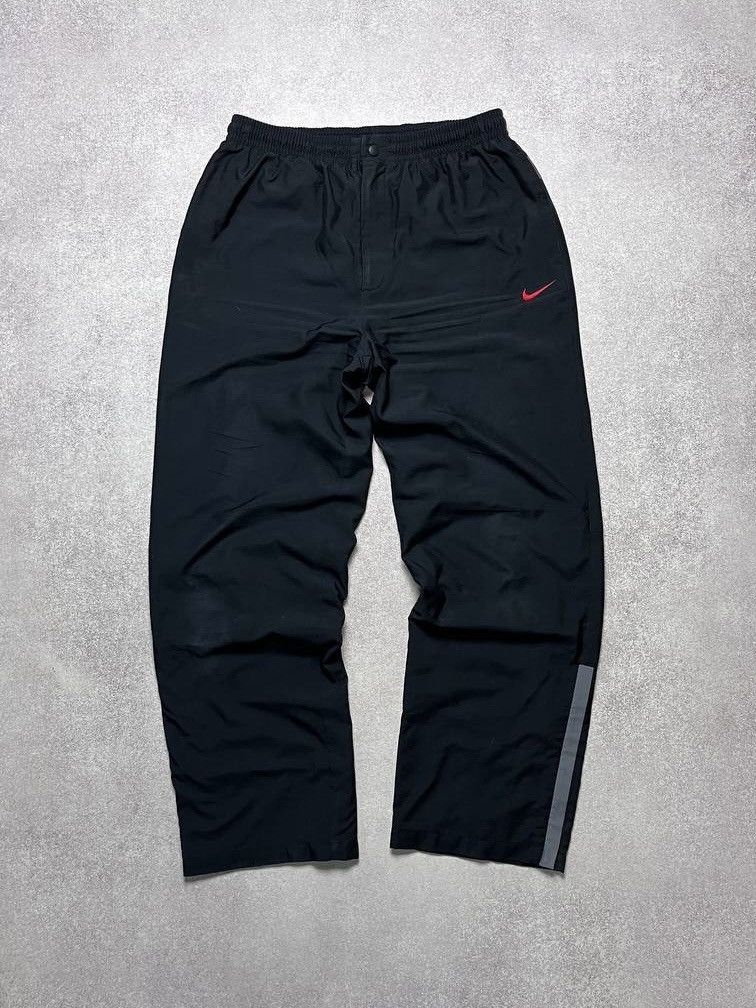Nike VINTAGE NIKE BAGGY SWOOSH 2004 TRACK PANTS L Size US 32 / EU 48 - 1 Thumbnail