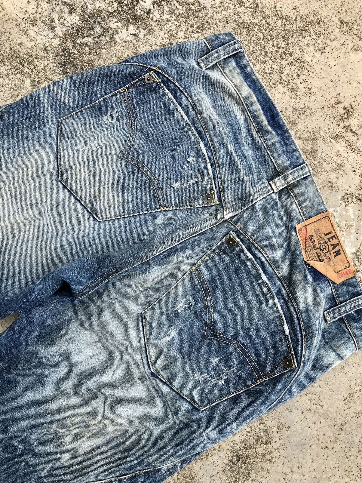 WASHED BLUE DISTRESSED 4CHA1 JEANS