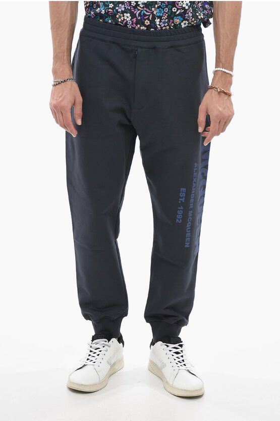 image of Alexander Mcqueen Brushed Cotton Sweatpants With Printed Logo in Blue, Men's (Size 33)