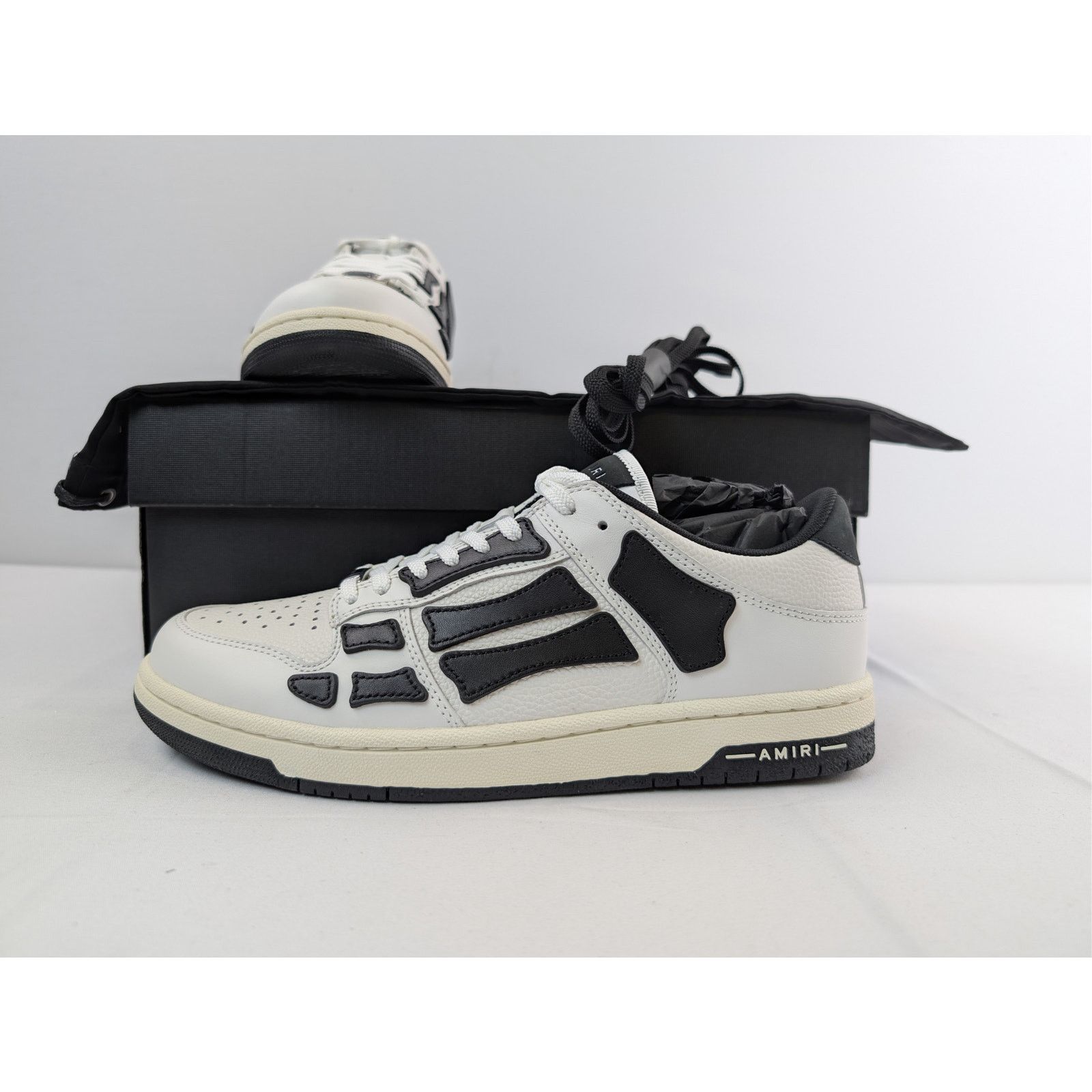Amiri o1rshd1 Skelton Low-Top Sneakers in White/Black Size US 12 / EU 45 - 19 Thumbnail