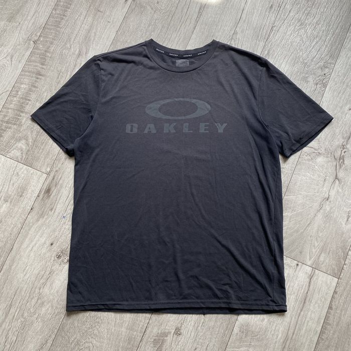 Vintage OAKLEY SOFTWARE Y2K SURF STYLE FADED T SHIRT | Grailed