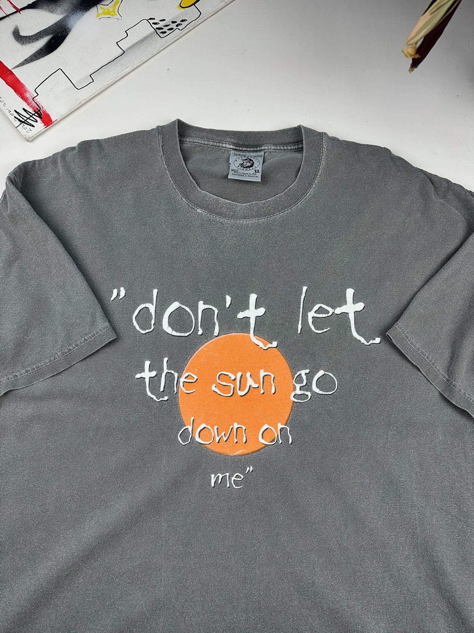 90s Elton John tee “Don’t let the sun go down on me”