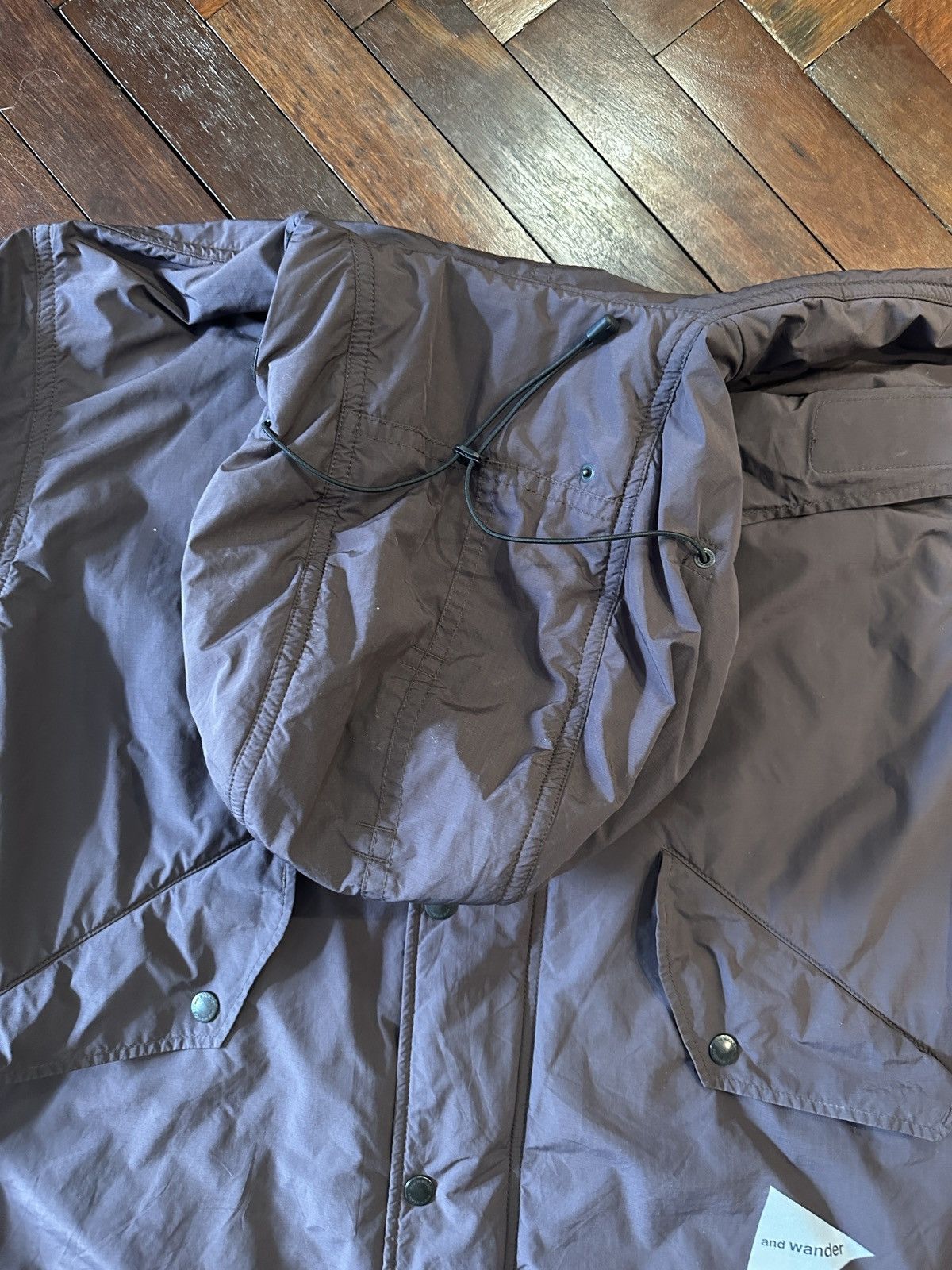 And Wander and wander Octa Jacket in Brown, size L/XL Size US L / EU 52-54 / 3 - 5 Thumbnail
