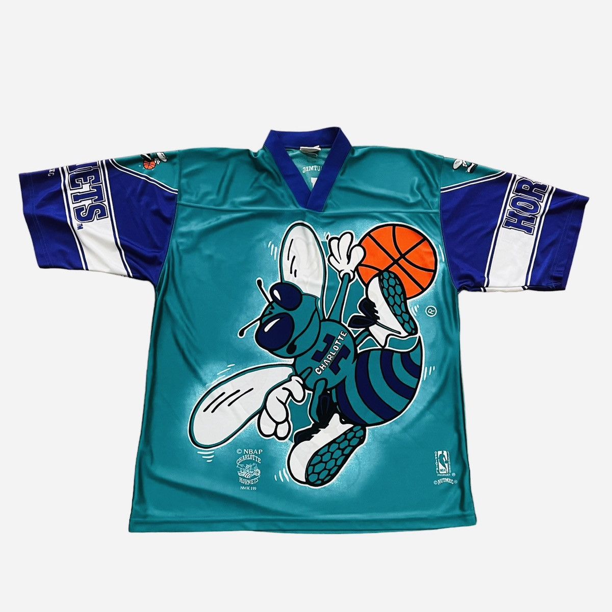 image of Vintage 90's Nutmeg Mills Charlotte Hornets Aop Football Tee, Men's (Size Large)