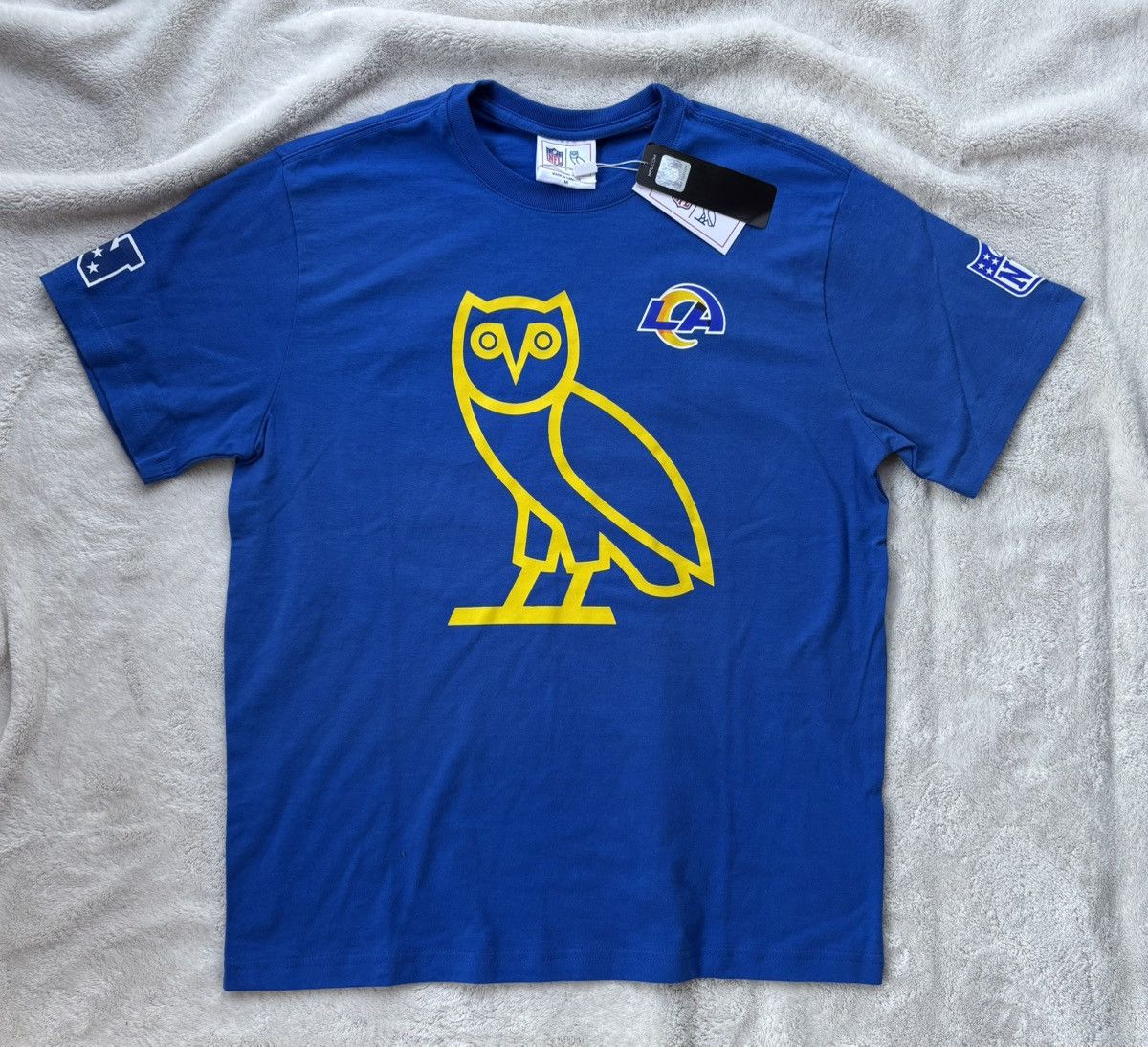 October's Very Own OVO x NFL LA Rams Blue OG Owl Tee Size US M / EU 48-50 / 2 - 1 Thumbnail